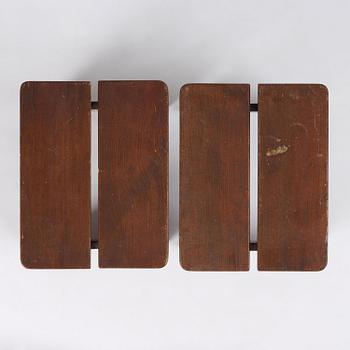 Axel Einar Hjorth, a pair of stained pine "Skoga" stools, Nordiska Kompaniet, Sweden, 1930s.