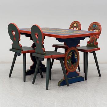 A second half of the 20th Century dining table and four chairs painted by the Hungrarian artist Laszlo Holló.