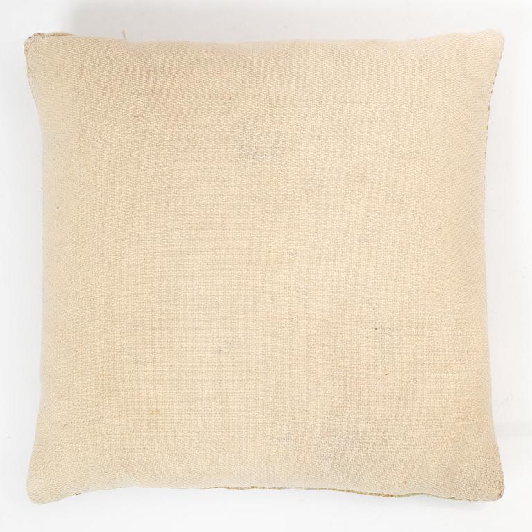 Märta Måås-Fjetterström, a cushion, 'Blommor på röd botten', signed MMF, c. 32 x 32 cm.