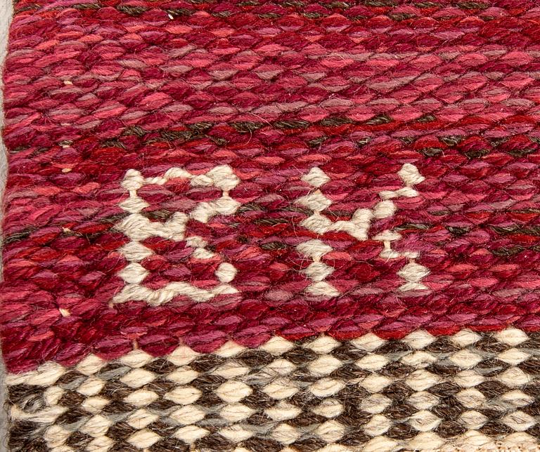 Berit Koenig, a signed flat weave carpet, Svensk Hemslöjd, ca. 210x130 cm.