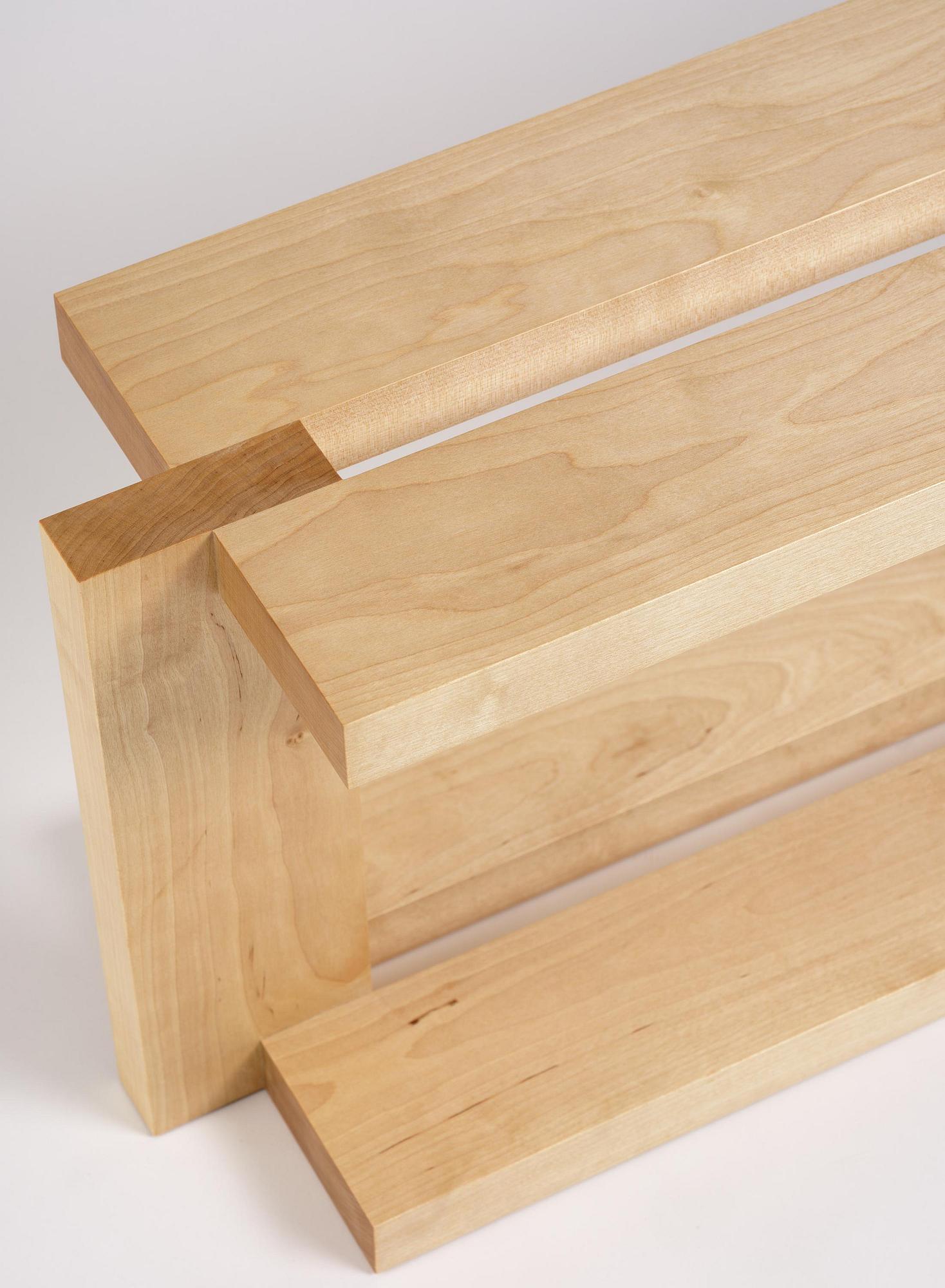 Nick Ross, an "Arrangement #16" coffe table/bench, executed in his studio, Stockholm, 2024.