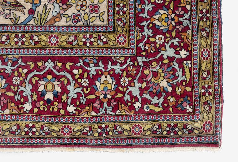 An antique Isfahan rug, Central Persia, c. 219 x 143 cm.