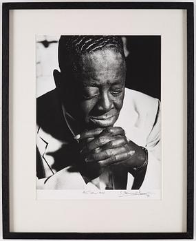 HERMAN LEONARD, gelatin silver print signed Herman Leonard and dated 88.