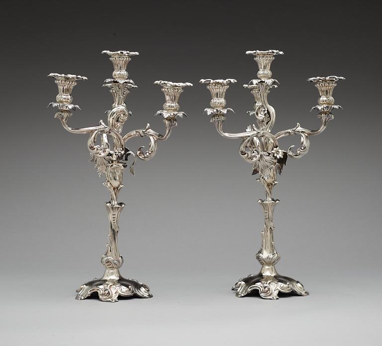 A pair of Swedish 19th century silver candelabra, makers mark of  Gustaf Möllenborg Feron 1861.