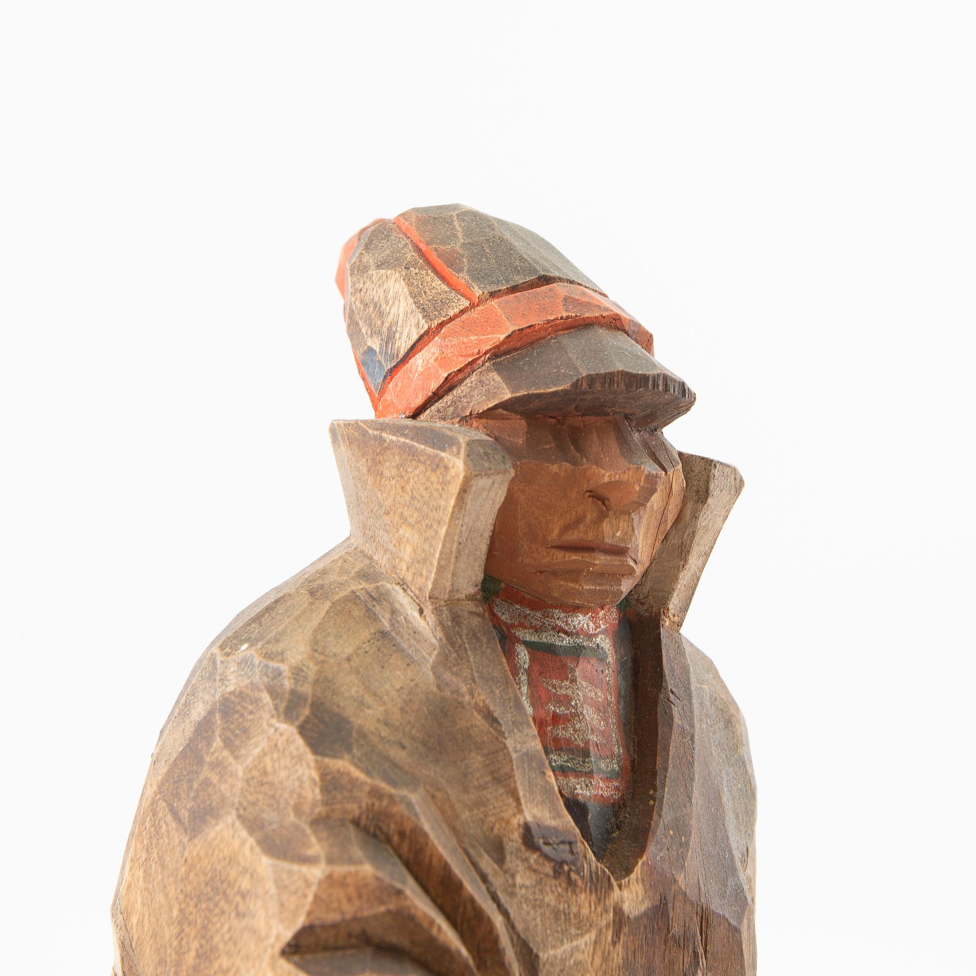 Sami, wood, 3 parts, indistinctly signed M Lenius?.