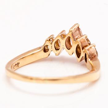 An 18K gold ring with marquise cut diamonds ca. 0.45 ct in total.