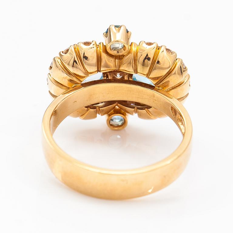An 18K gold ring "Sophia Albertina" with topazes and diamonds ca. 0.72 ct in total. Ofelia Jewelry, Helsinki 1998.