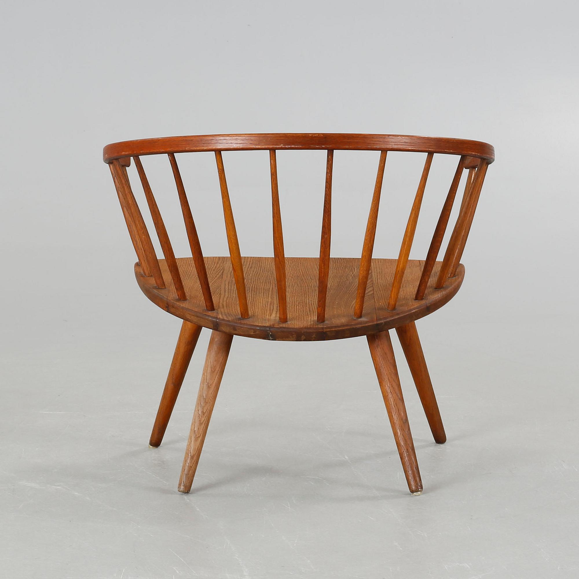 A chair named "Arka", designed Yngve Ekström and made in the third quarter of the 20th century.