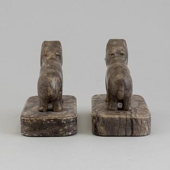 A pair of stone book ends, early 20th century.