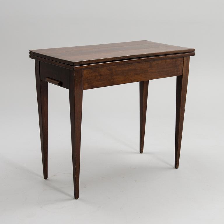 A GAME TABLE, early 19th century.