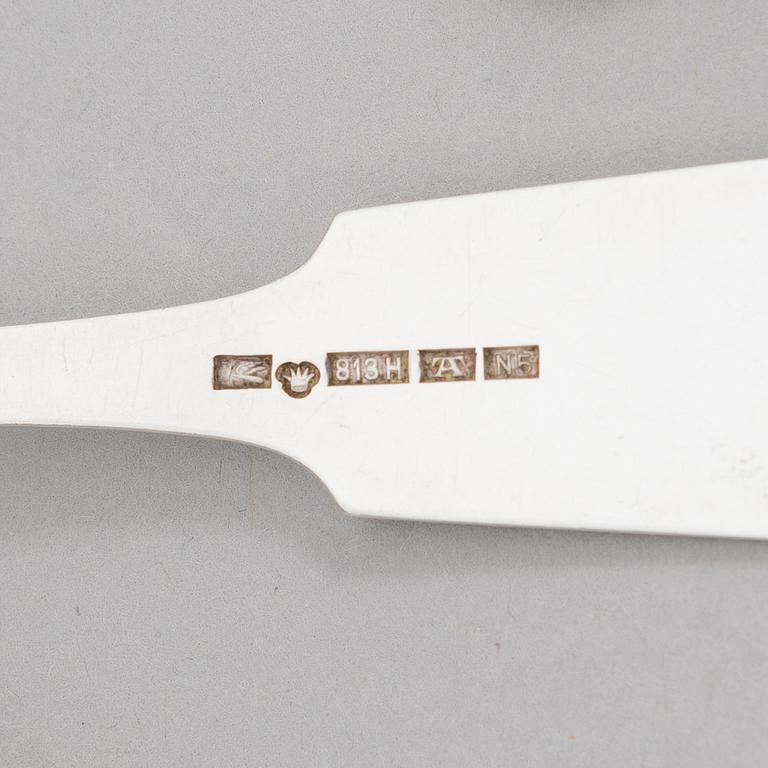 A 42-piece set of silver cutlery with seashell decorated handles, Finnish hallmarks, 1918-1950.