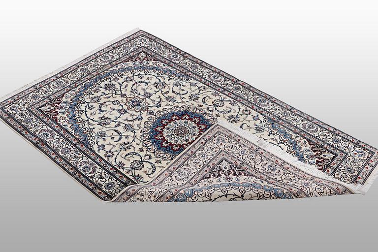 A rug, Nain, Part Silk, sk 6 LAA, ca 204 x 137 cm.