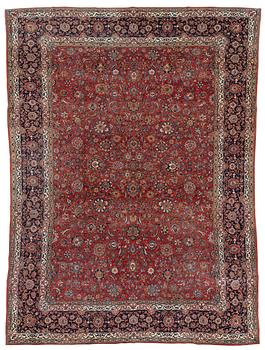 380. An antique 'Manchester' Kashan carpet, ca 354 x 259 cm.