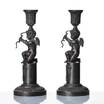 A pair of German (Berliner Eisen) Empire iron candle sticks.