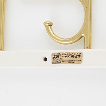 A 'Dekorativ' coat hanger, Skogslunds Metallgjuteri,  Anderstorp, 1950's/60's.