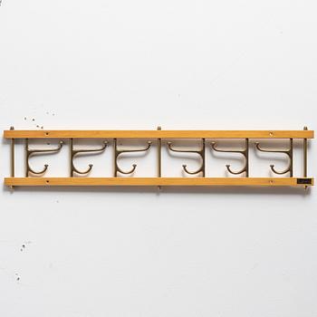 A 'Dekorativ' coat hanger, Skoglunds metallgjuteri, Anderstorp, 1950s/60s.