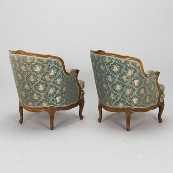 Fåtöljer, ett par och fotpall, 1900-talets mitt.