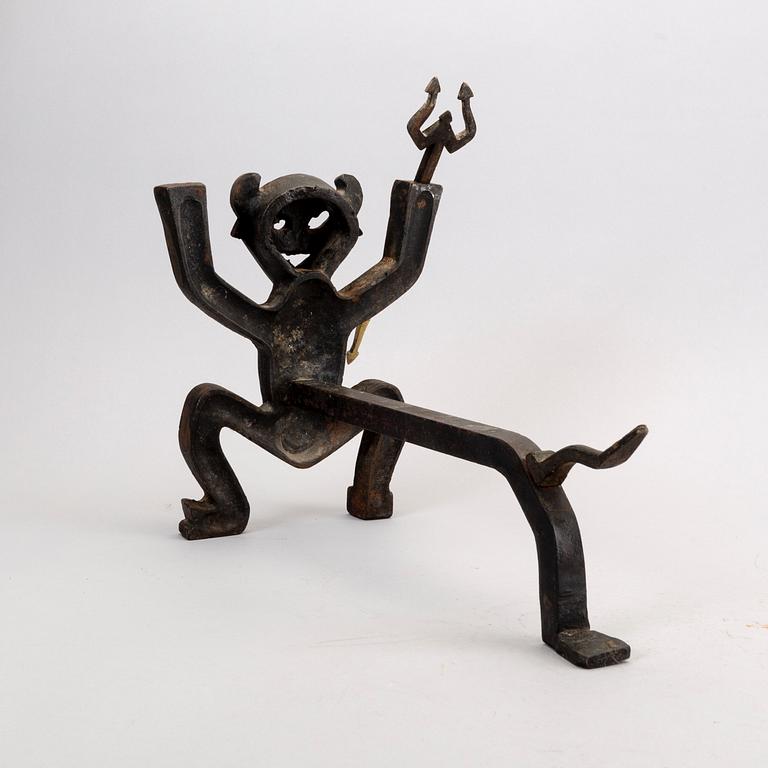 A cast iron fire dog by Eskil Björklund mid 1900s.