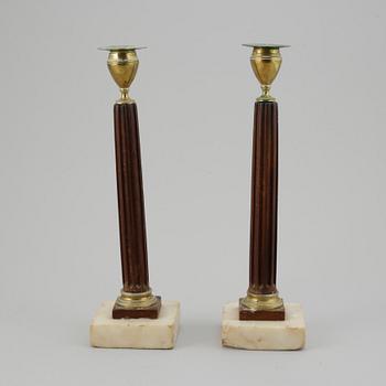 A pair of late Gustavian late 18th-century candlesticks.