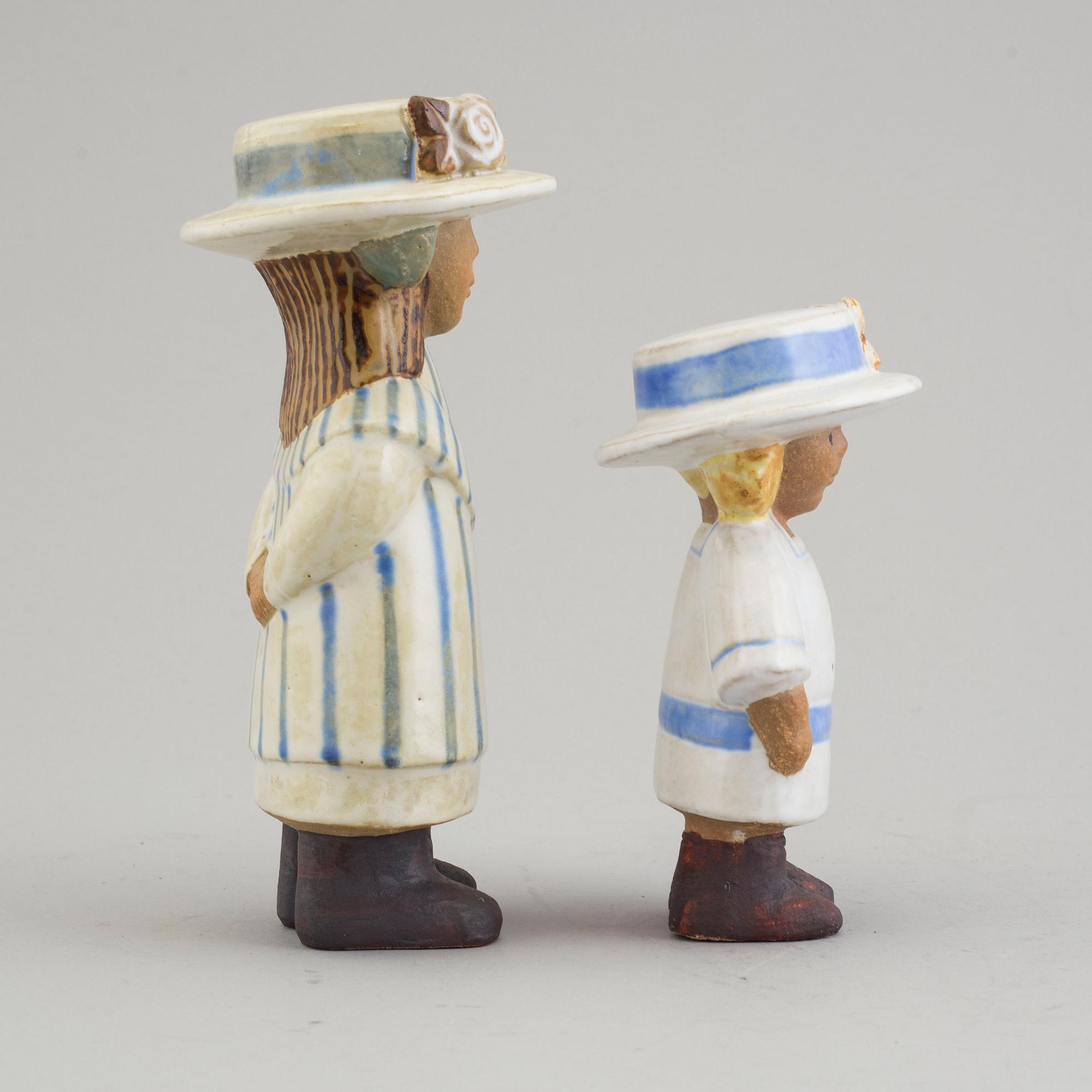 LISA LARSON, 2 stoneware figurines.
