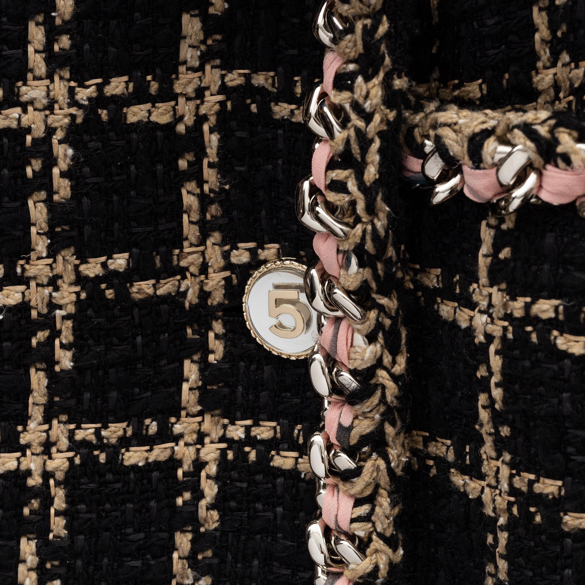 Chanel, a bouclé jacket size 34.