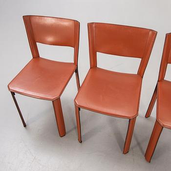 A set of four Matteo Grassi leather chairs later part of the 20th century.