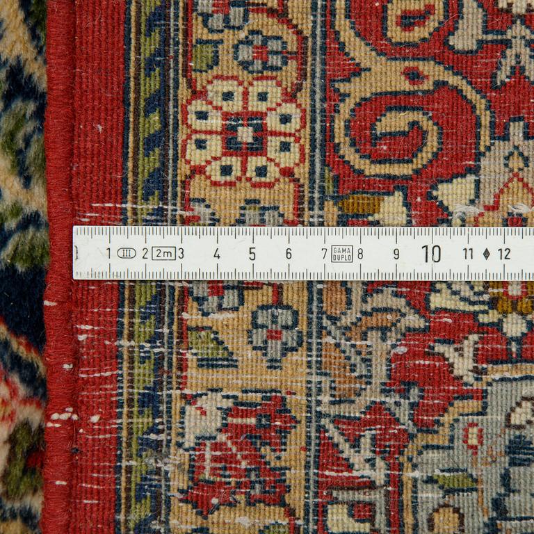 A rug, semi-antique, oriental, ca 238 x 139 cm.