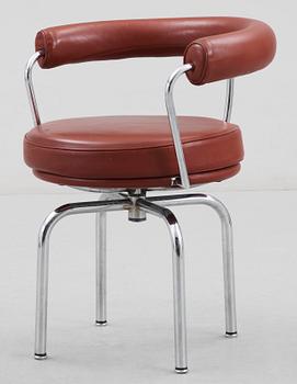 A Le Corbusier 'LC 7' chromed steel and braun leather chair, Cassina, Italy.