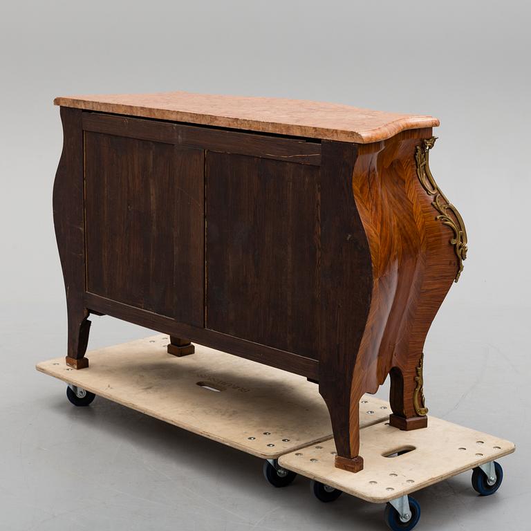 An early 20th century Central Europe Louis XV style chest of drawers.