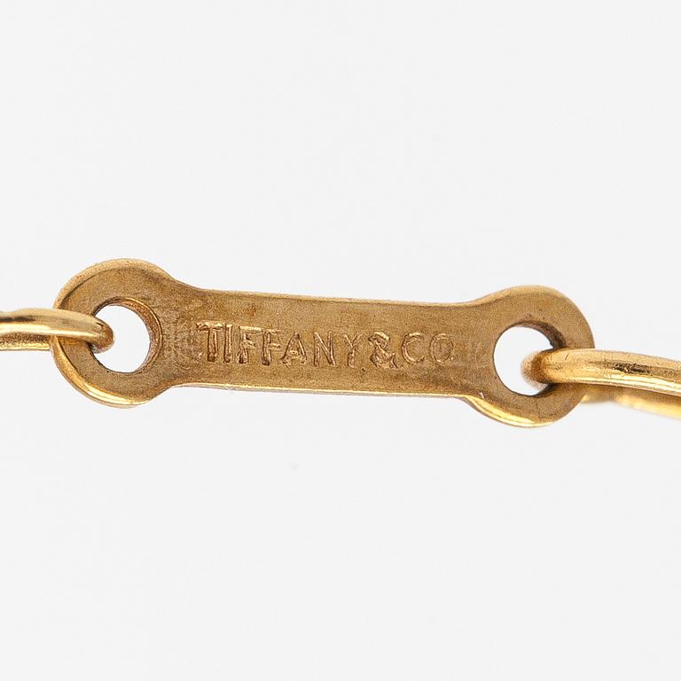 Tiffany & Co, Elsa Peretti, an 18K gold necklace, "Open Heart",