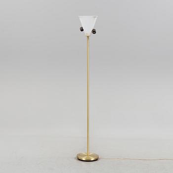 A 1960s brass floor light.