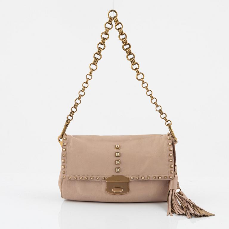 Prada, a pink leather and tassle bag.