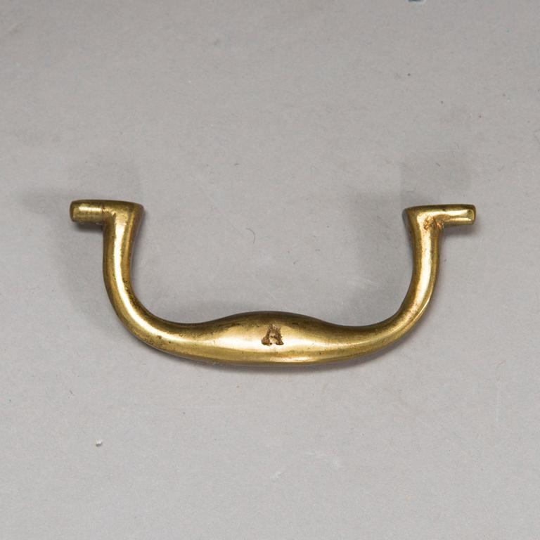 A chest of drawers, England, second half of the 20th century.