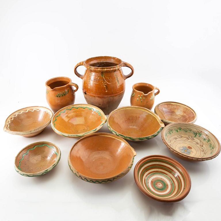 Jug, spill bowl and bowls 11 dl Skåne 20th century glazed earthenware.