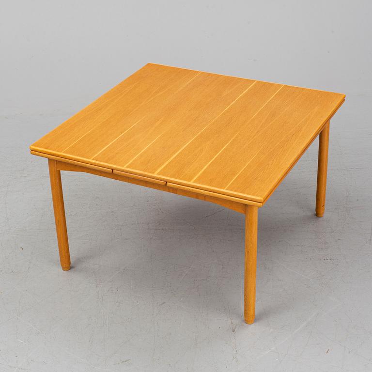 A Norwegian table, Heggen, 1950s-60s. Four leg extenders included.