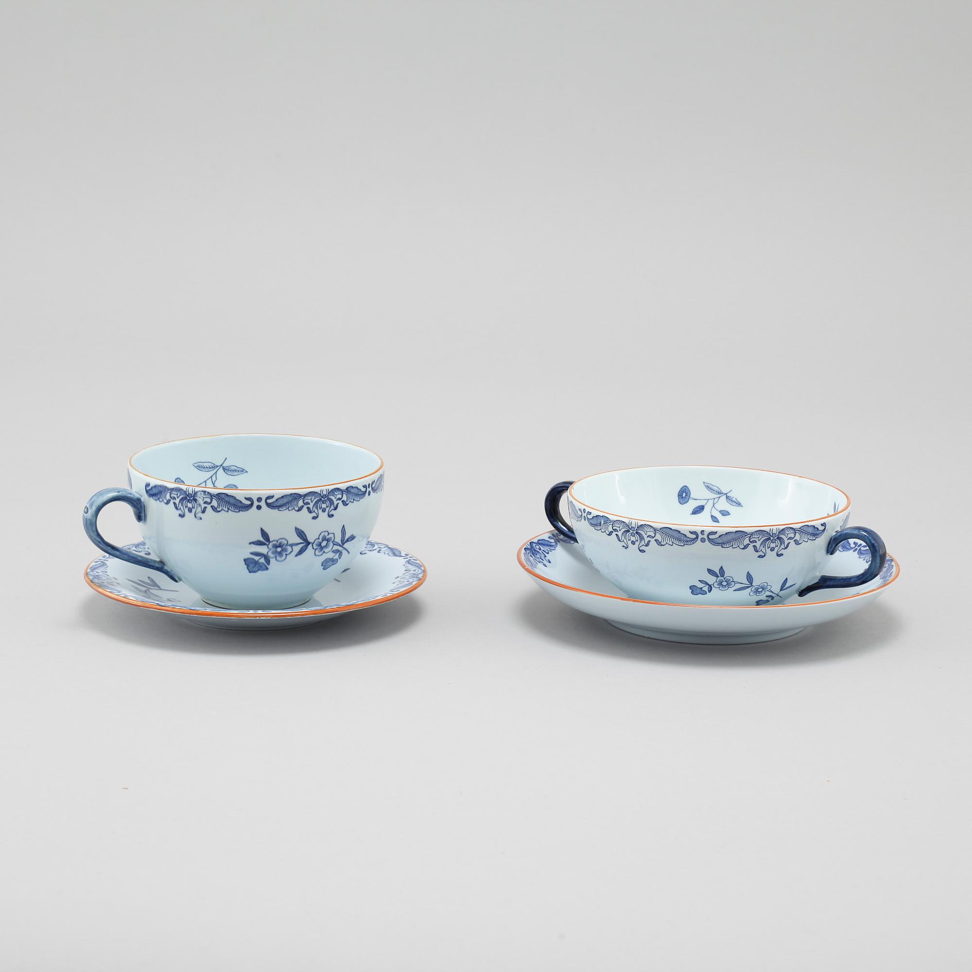 Seven "Ostindia" broth cups with sausers and chocolate cups with sausers in earthenware, Rörstrand, 20th century.