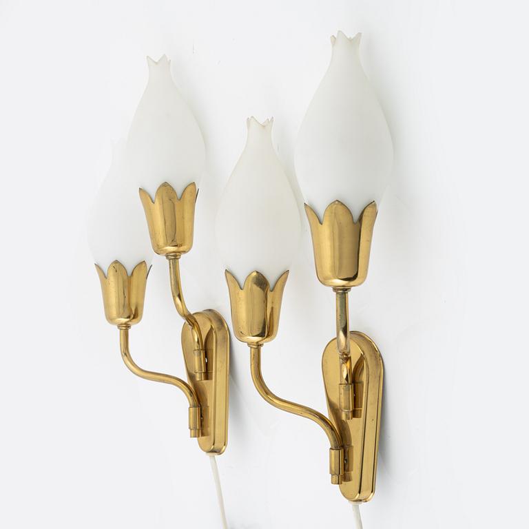 A pair of 'Tulip' brass wall lights, Fog & Mørup, mid 20th Century.