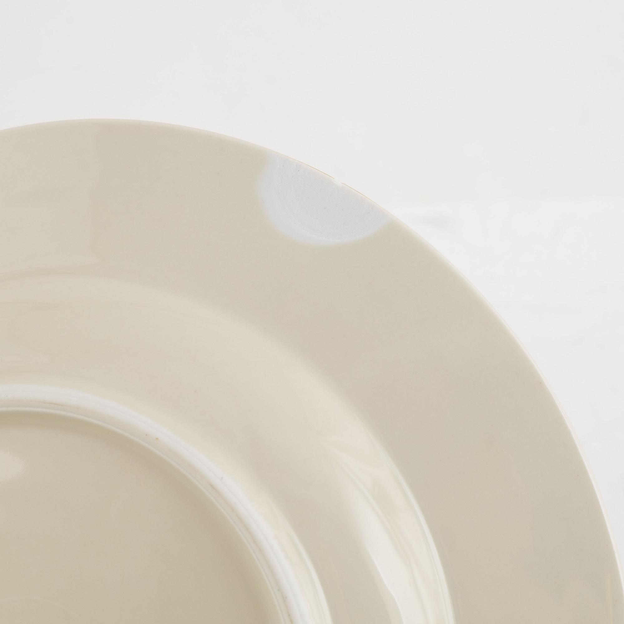 A 69-piece porcelain dinner service, Johann Haviland, Bavaria.