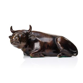 884. A bronze sculpture of a reclining buffalo, Qing dynasty, 19th Century.