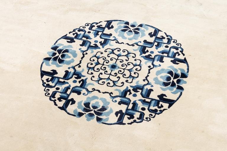 A semi-antique/old Chinese carpet, c 320 x 232 cm.