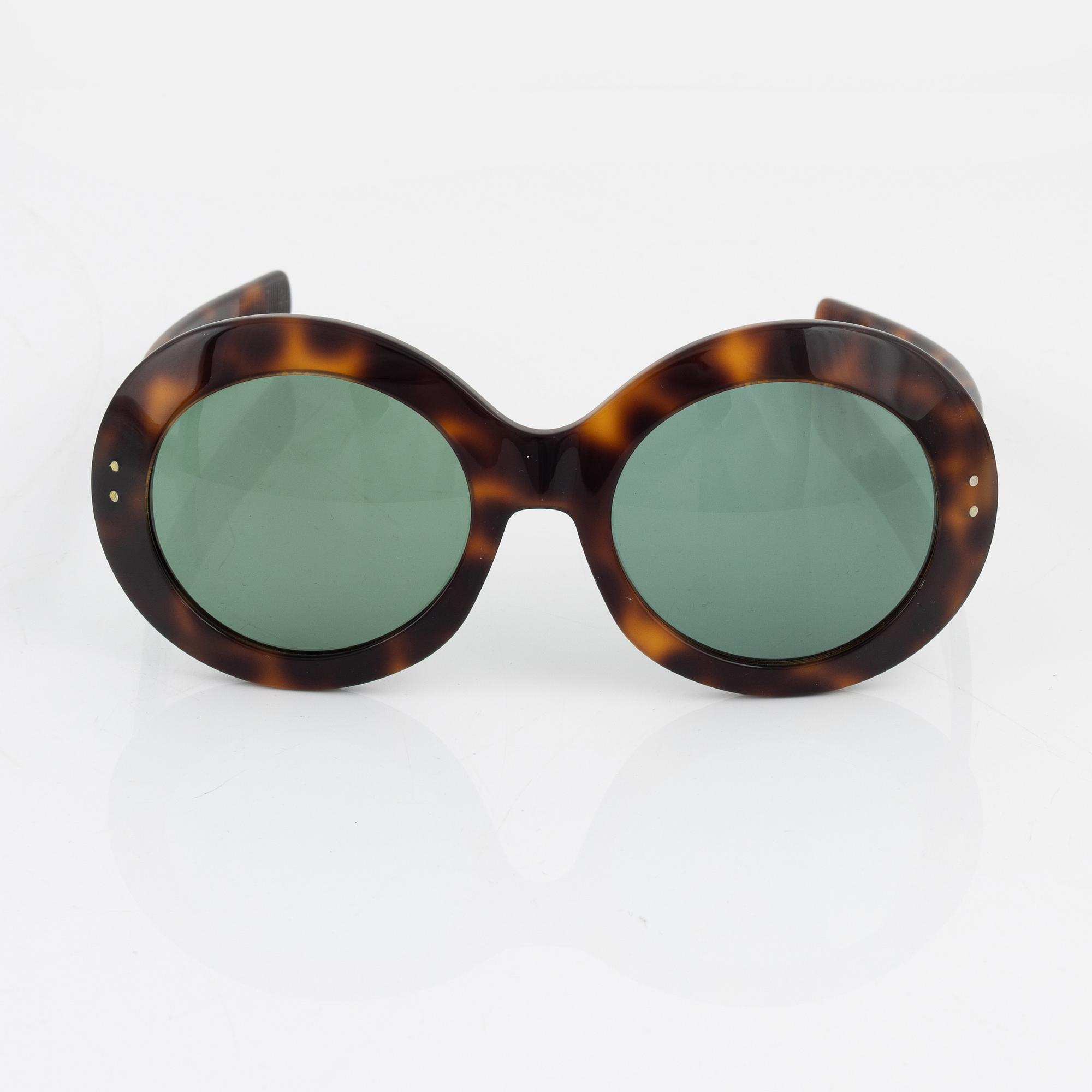 Oliver Goldsmith, a pair of tortoise "Koko" sunglasses.