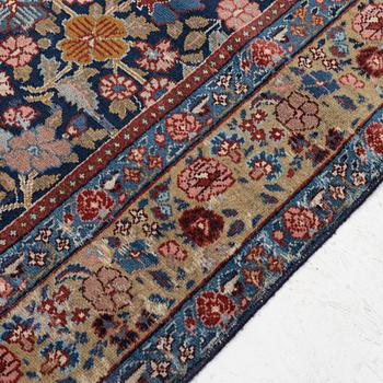 A rug, possibly Tabriz, c. 195 x 137 cm.