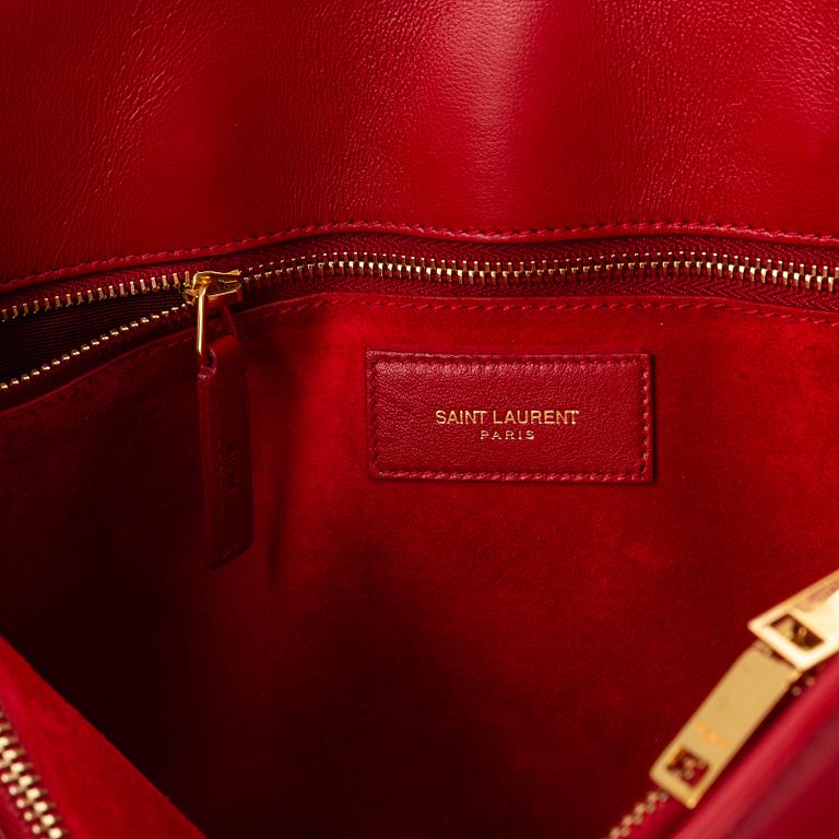 Saint Laurent, a red leather 'Sac du Jour Small' bag.