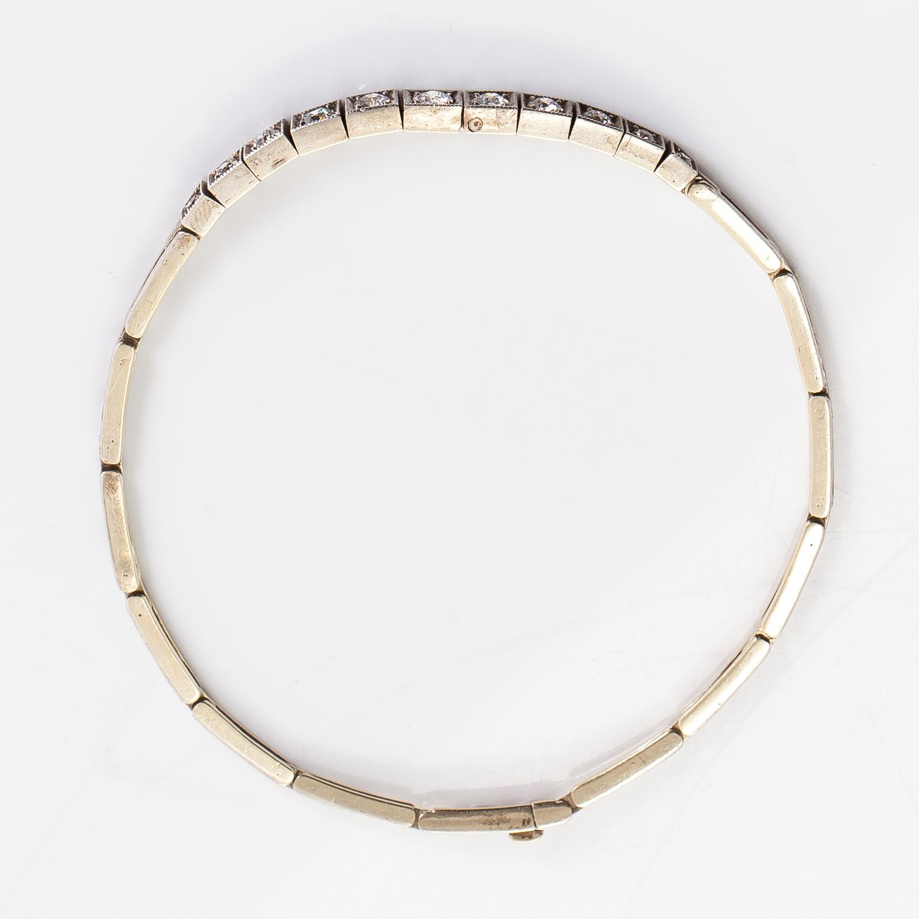 A ca 14K gold/silver bracelet, with diamonds total approx 0.92 ct, Moscow 1927-46.