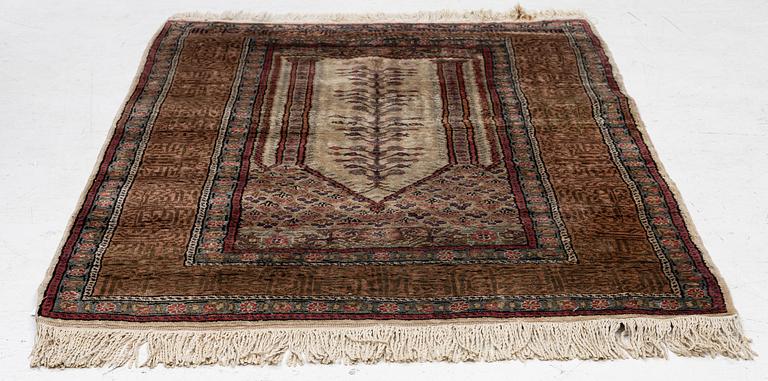 A Kaiseri prayer rug, c. 135 x 90 cm.