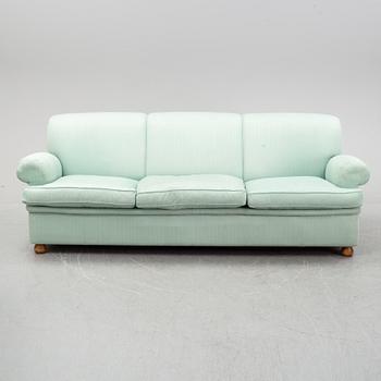 A model 703 sofa by Josef Frank for Firma Svenskt Tenn.