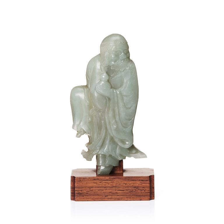 A carved nephrite sculpture of a lohan, Qing dynasty (1664-1912).