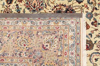 A carpet, old Keshan, approx. 418 x 314 cm.