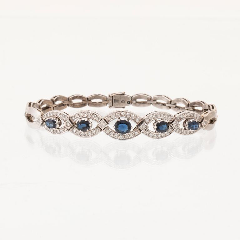 An 18K white gold bracelet set with oval faceted sapphires and brilliant-cut diamonds, Stockholm.