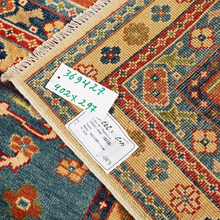 A Kazak carpet, c. 402 x 297 cm.